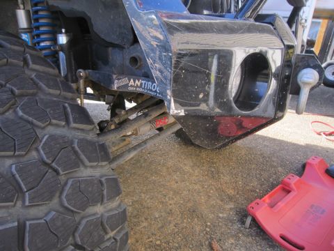 2008 Jeep Wrangler - Close-up of an off-road vehicle's front bumper and tire, with visible aftermarket parts.