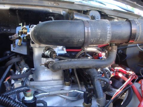 1989 Ford Bronco - Close-up view of an engine bay, showing various components and wiring.