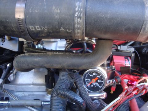 1989 Ford Bronco - Engine bay detail with a fuel pressure gauge reading 40 PSI.
