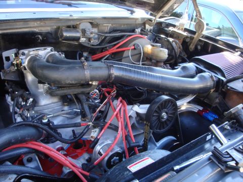 1989 Ford Bronco - Engine bay of a 1989 Ford Bronco, showing the engine and intake system.