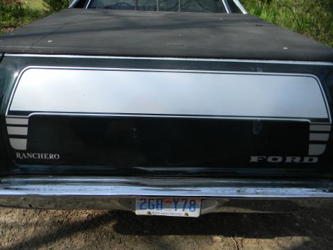 1979 Ford Ranchero - Rear view of a 1979 Ford Ranchero, showing the tailgate and chrome bumper.