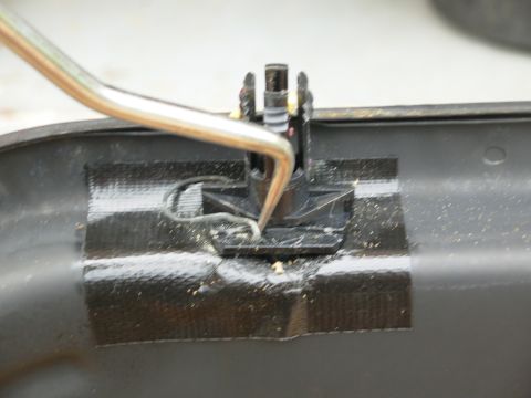 1994 Ford Crown Victoria - The clips can't be seen with the upholstery in place, but this what has to be done: the clips need to come out of their slots so the headre…