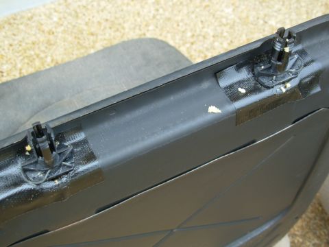 1994 Ford Crown Victoria - The clips open toward each other, so they have to be pulled apart to release the headrest.