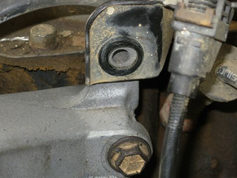 1983 Ford Bronco - This hole isn't threaded for van 4.9Ls, and it's necessary to support the pickup/Bronco throttle cable bracket.