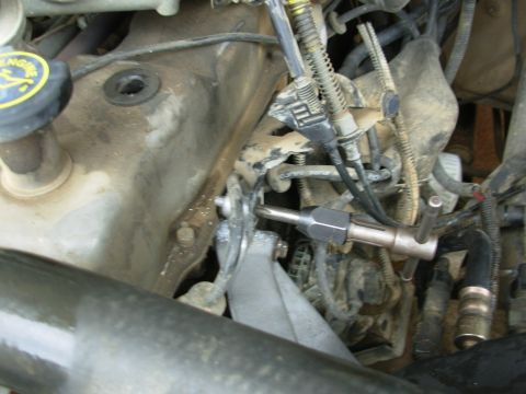 1983 Ford Bronco - Fortunately, it's already sized (5/16") for a 3/8-16 tap, so threading it only took a couple of minutes.