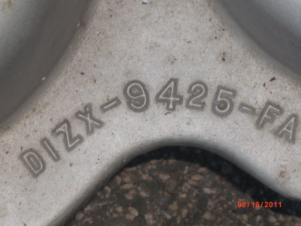 Metal part with stamped numbers DIZX-9425-FA