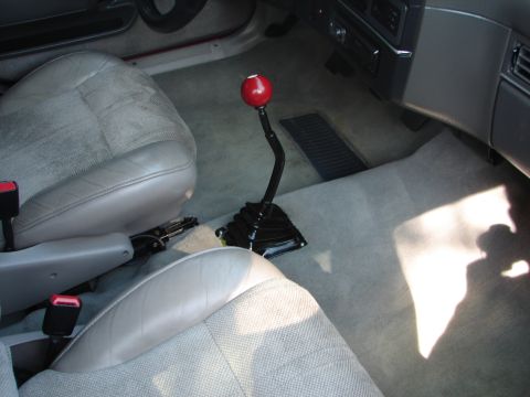 1992 Ford Taurus - Interior view of a car, focusing on the shifter and seats.
