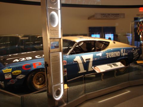 1992 Ford Taurus - A 1969 Ford Torino GT race car is displayed in a museum, alongside another racing vehicle.