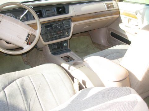1994 Ford Crown Victoria - With some trimming along the bottom & front, it fits surprisingly well. No idea yet what to do with the shifter hole, but I might put the S…