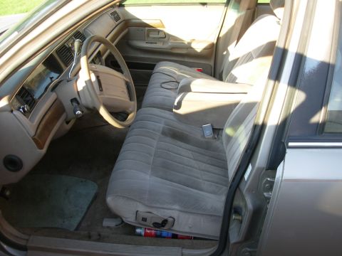 1994 Ford Crown Victoria - The velour power split bench is OK, but I've never liked the armrest - not sturdy enough. And I've always thought I'd like a floor console.