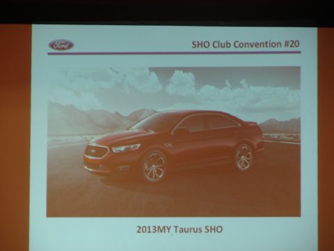 1992 Ford Taurus - Presentation slide shows a 2013 Ford Taurus SHO with mountains in the background.