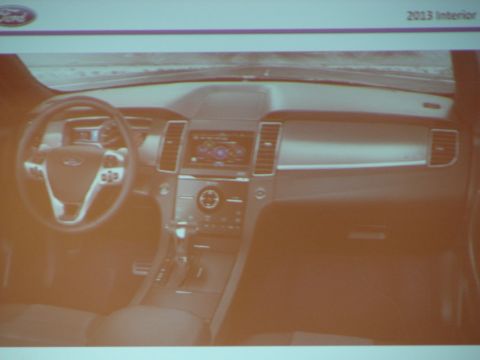 1992 Ford Taurus - Interior view of a 2013 Ford Taurus, showing the dashboard, steering wheel, and center console.