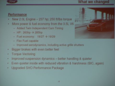 1992 Ford Taurus - This slide lists performance improvements for a vehicle, including engine specs and handling enhancements.