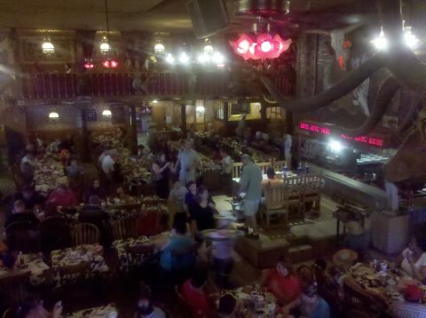 1992 Ford Taurus - View of a crowded restaurant interior, showing multiple dining areas and patrons.