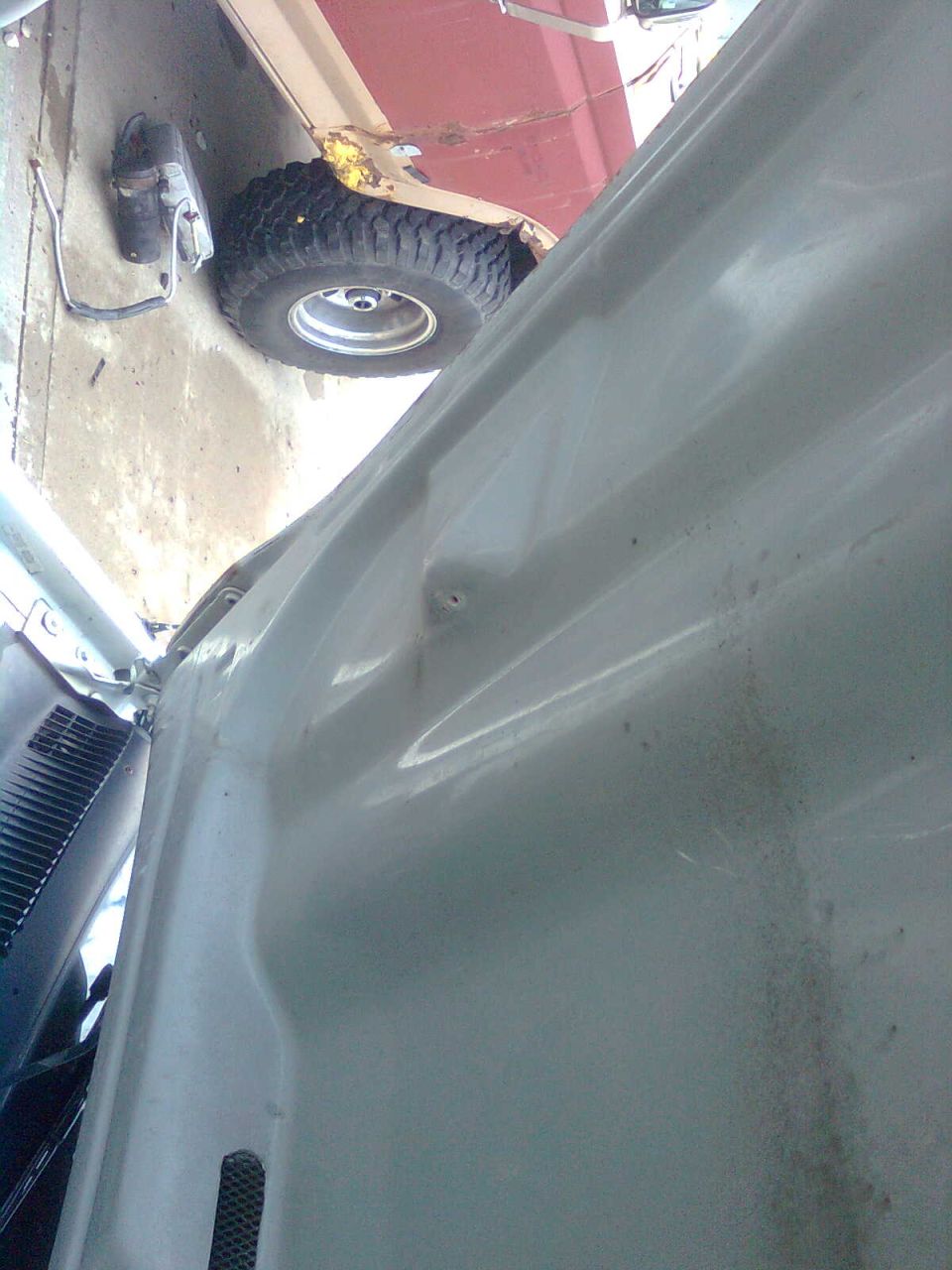 White SUV fender and tire