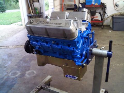 1997 Ford Ranger - A freshly painted Ford Racing V8 engine is mounted on an engine stand.