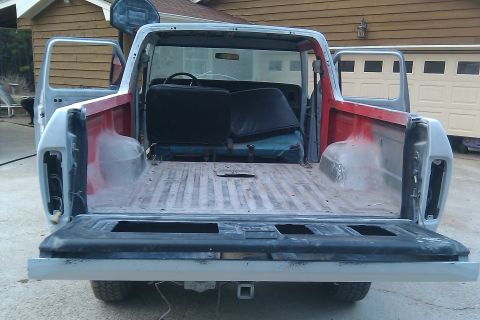 1978 Ford Bronco - This Ford Bronco appears to be undergoing restoration, with its interior and bed exposed.