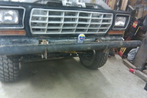 1978 Ford Bronco - Front view of a 1978 Ford Bronco, showing its distinctive grille and bumper.