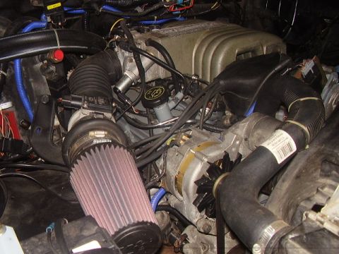 1986 Ford Bronco - Close-up view of an engine bay, showing various components and wiring.