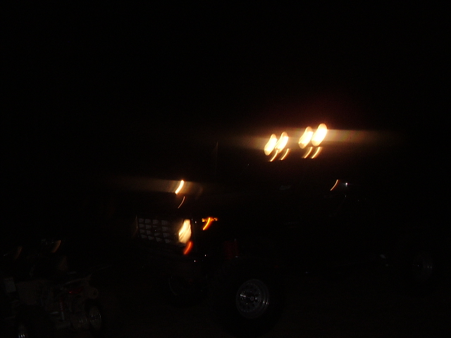 Truck front with roof lights illuminated at night