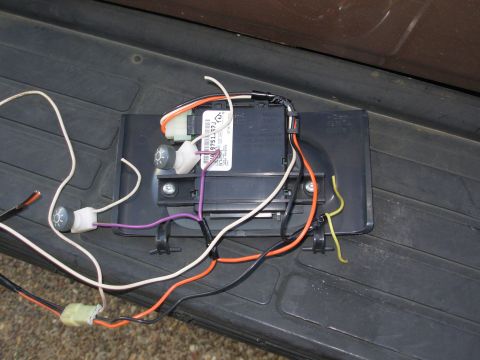 1997 Chevrolet Silverado 3500 - I found this HomeLink module in a similar console in a later truck with different upholstery, so I pulled it to install in mine.