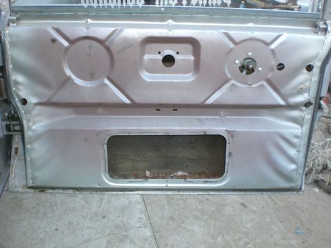 1972 Cadillac Fleetwood - Door panel and access panel removed. You see its already punched for the regulator and has the stops already welded in.
