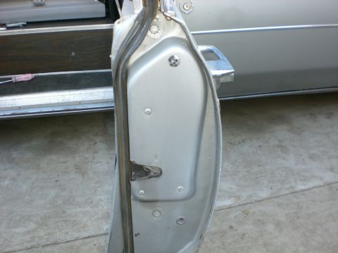 1972 Cadillac Fleetwood - Four bolts need to be removed to remove window frame. 2 on each end of the door. The glass will come out with the frame. Be careful its hea…