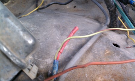 1978 Ford Bronco - Close-up view of engine bay wiring, showing various colored wires and connectors.