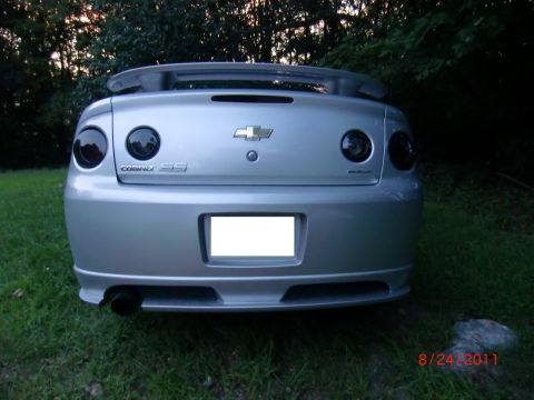 2009 Chevrolet Cobalt - The rear of a silver Chevrolet Cobalt SS is shown with a spoiler and tinted taillights.