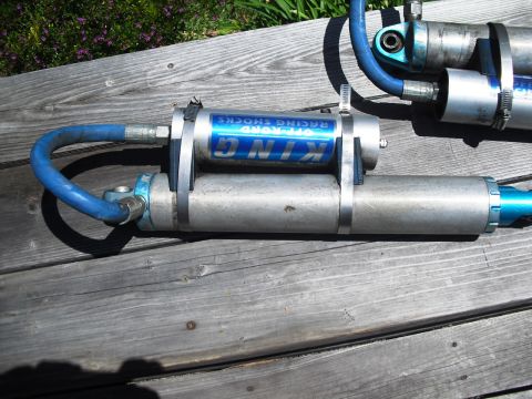1986 Ford Bronco - Close-up of King Off-Road Racing Shocks, showing their construction and branding.
