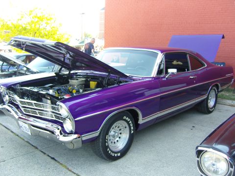 2007 Ford Mustang - A purple classic car is displayed with its hood open, revealing the engine compartment.