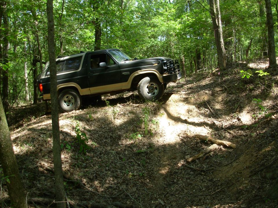 It came out a lot more easily than I expected - I didn't even need the winch to get here.  But there had always been a stump that made this little hilltop tricky, so I pulled it out today.