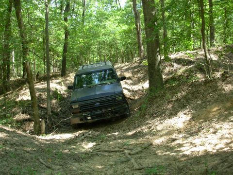 1983 Ford Bronco - This turn is hairy because there's nothing to gauge "level" from, other than the trees, and it's a tight turn into a blind dropoff, making…