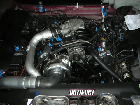 1992 Ford Crown Victoria - Custom engine build a supercharger and intake system, with visible ADTR.net branding on the engine cover.