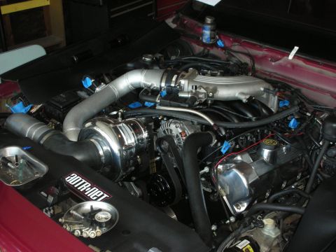 1992 Ford Crown Victoria - Custom engine build a polished supercharger and intake system, with "30TR.net" branding on the engine cover.