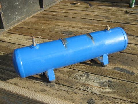 1972 Ford F-250 - Blue air tank with fittings, mounted on wooden surface.