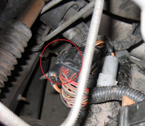 1992 Ford Bronco - Close-up view of a vehicle's wiring harness connector with multiple colored wires.