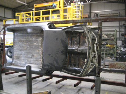 1973 Ford Ranchero - The body of a 1973 Ford Ranchero is shown on a stand, undergoing restoration.