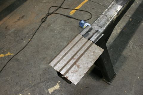 1973 Ford Ranchero - Metal fabrication in progress, showing a welded section and workshop floor.