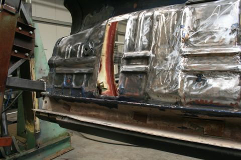 1973 Ford Ranchero - The quarter panel of a 1973 Ford Ranchero is shown during a metal repair process.