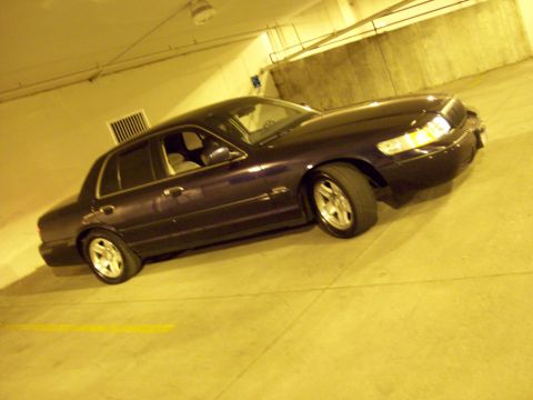 1999 Mercury Grand Marquis - This sedan's body style suggests a model year around 2000, not 1999.