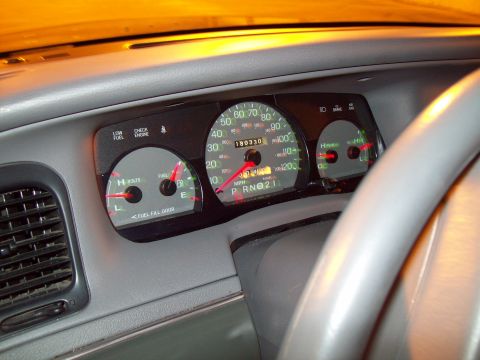 1999 Mercury Grand Marquis - The dashboard of a 1999 Mercury Grand Marquis displays the odometer reading and fuel gauge.