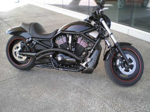 2008 Harley-Davidson VROD VRSCD - A black Harley-Davidson V-Rod VRSCD motorcycle is shown from a three-quarter front view, parked on a paved surface.