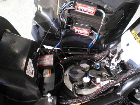 2008 Harley-Davidson VROD VRSCD - Motorcycle engine bay showing intricate wiring and electronic control units.