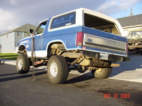 1989 Ford Bronco - Tires off the ground from the slider