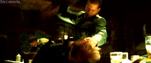 2000 Mercury Grand Marquis - A person in a green shirt is visible in a dimly lit environment with blurred lights in the background.