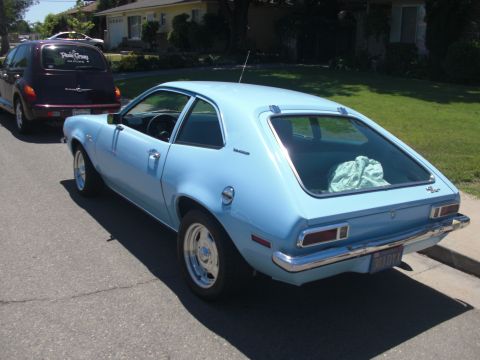 1972 Ford Pinto - This 1972 Ford Pinto hatchback is seen from the rear, parked on a residential street.