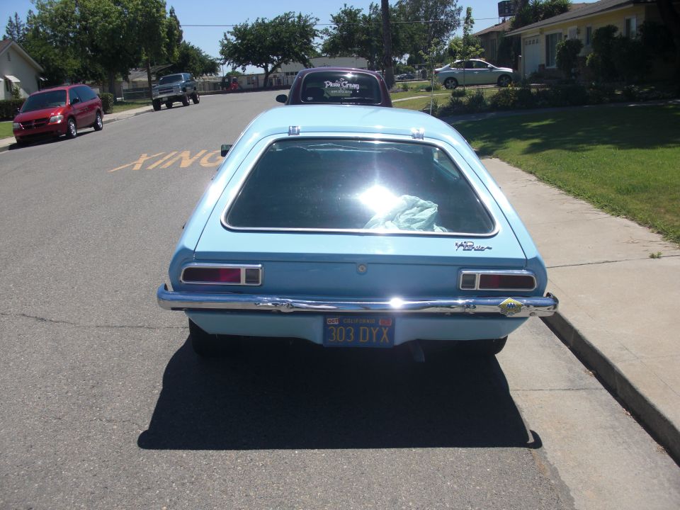 1972 Ford Pinto hatchback, rear view, parked on street. California license plate 303 DYX