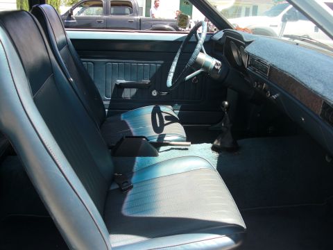 1972 Ford Pinto - Interior view of a 1972 Ford Pinto, highlighting the seats and dashboard.