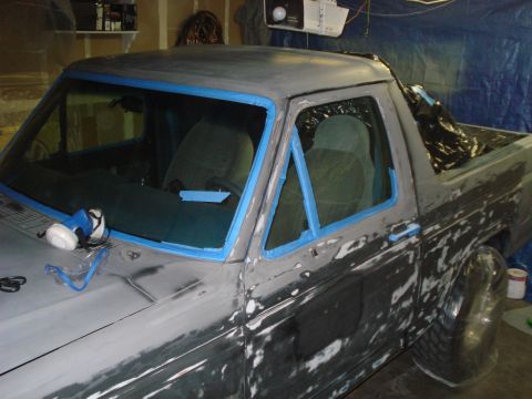 1972 Ford Pinto - Ford Bronco II undergoing bodywork, with windows taped for protection.